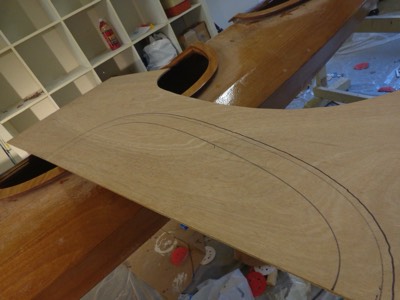  7/13/17 -  The shape of a custom center cockpit hatch is traced onto  wood. 