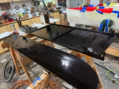  5/24/25 - Daggerboard and solar panel mount are painted on one side.  