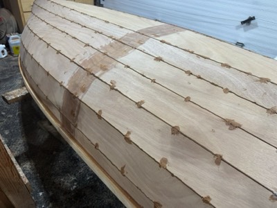  4/7/25 - The hull is flipped and gaps in seams are filled.  