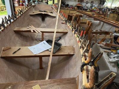  Port inwale is epoxied in place. 