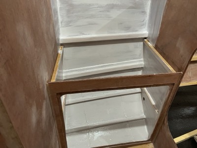  Interior of chart table cabinet is painted. 