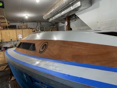  Deck is taped off for final hull paint and varnish on #1 panel. 